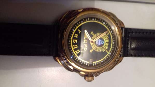 Продам часы с символикой на циферблате