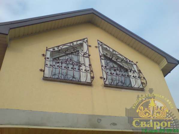 Решетки на окна кованые - лучшая защита жилья в фото 5