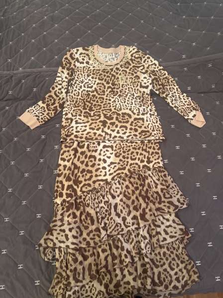 Костюмы женские