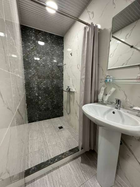 Xaziniy Hotel в фото 7
