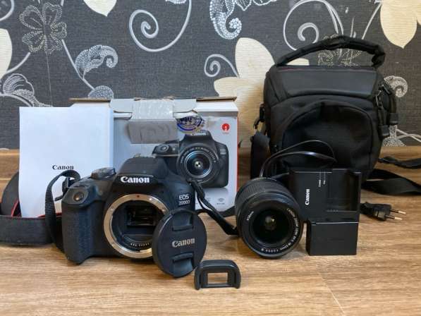 Зеркальный фотоаппарат Canon EOS 2000D в идеальном со